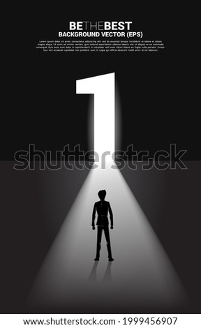 Silhouette of businessman standing in front of exit door number one. Concept of career start up and champion business solution.