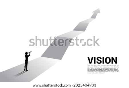 Silhouette of businessman  looking through telescope on forward arrow. business concept for mission and finding trend.