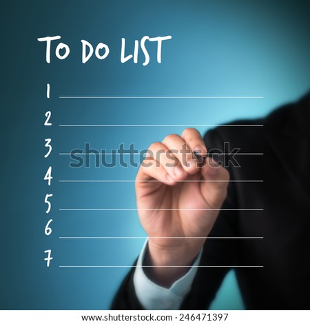 business man writing blank to do list