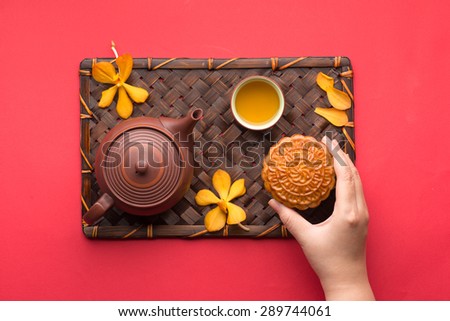 Mooncake and tea,food and drink for Chinese mid autumn festival. angle view from above