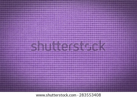 Abstract violet background from synthetic fabric in black shadow