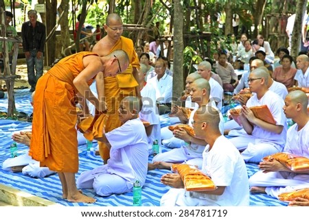 PATHUMTHANI THAILAND - JUN 6 : Unidentified Monks and novices in initiation ceremony on Jun 6, 2015 at Panyanantaram temple in Pathumthani, Thailand