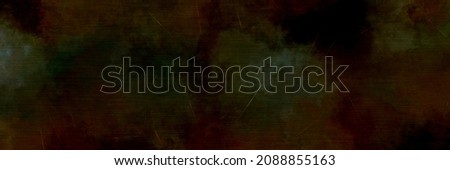 Grunge dark green brown warm scrapbook panoramic background, scratched paint texture design, flowing splotch gouache stains, wrinkled goth darker texture in borders with blank space for text 商業照片 © 