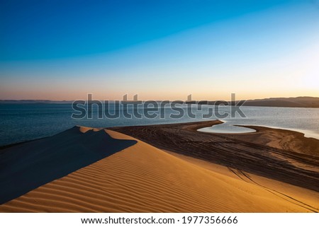 Similar – Image, Stock Photo Intense sunset at the coast of Reykjavik, Iceland