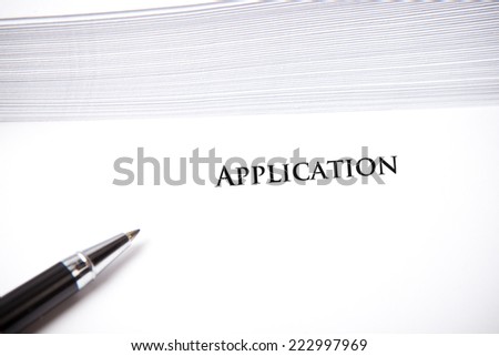 empty document with application headline in front of envelopes, space for sample text