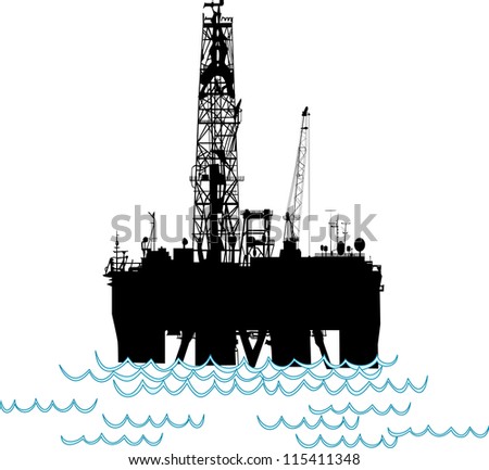 Silhouette of an oil rig in the middle of the ocean.