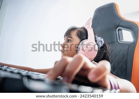 Similar – Image, Stock Photo Little concentrated girl with hairbuns is planting a flower in a flowerpot. Spring indoor activity. Caucasian ethnicity. Front view. Vertical shot. Selective focus