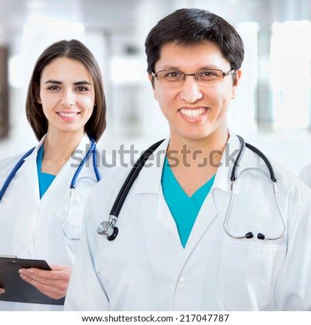Doctor giving his younger colleague a piece of advice concerning the diagnosis