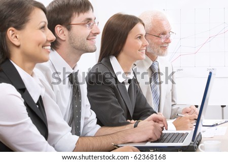 Modern business people work at a seminar