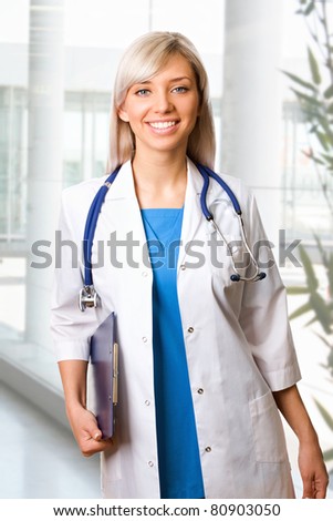 A woman doctor walking down the corridor Hospital