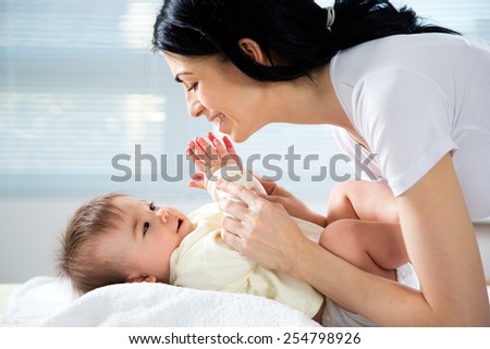 Happy mother with adorable baby