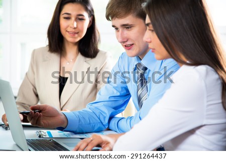 Business people working on their business project together at office