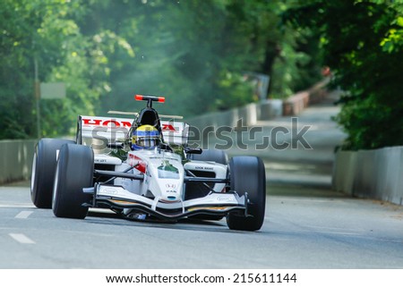 AARHUS, DENMARK - MAY 17 2014: Johan Rajamaki in a BAR/HONDA formula one racing car at the Classic Race Aarhus 2014