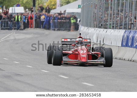 AARHUS, DENMARK - MAY 23 2015: Claus Bertelsen in a Ferrari Jean Alesi formula one racing car from 1992 at the Classic Race Aarhus 2015