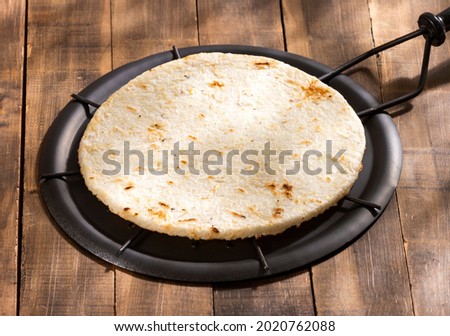 Colombian arepa on the grill - Traditional colombian food Photo stock © 