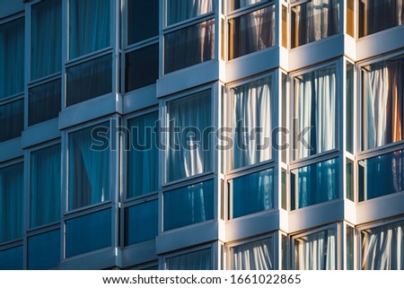 Similar – Image, Stock Photo Eclectic glazed facade of an urban building