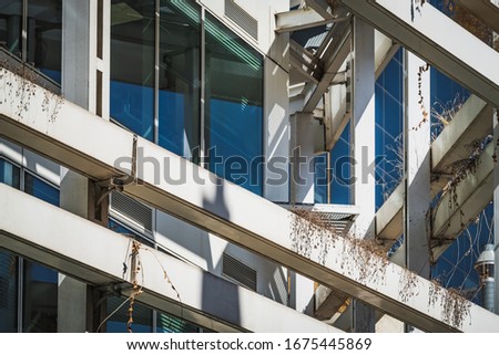 Similar – Image, Stock Photo Eclectic glazed facade of an urban building