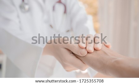 Similar – Image, Stock Photo Female doctor in coveralls holding COVID-19 PCR nasal swabbing kit