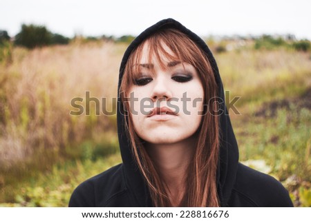 Close-up portrait of girl. Portrait of beautiful brunette. Makeup, open mouth