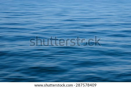 Motion blurred of sea wave for background