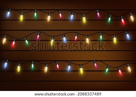 Similar – Image, Stock Photo multi colored christmas lights at night on the street, christmas decoration