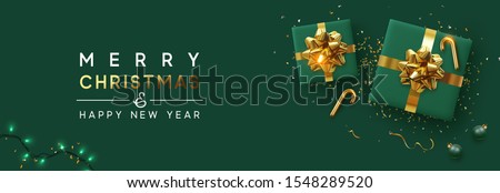 Similar – Image, Stock Photo Gift box with green ribbon on and candy canes on red bold color background