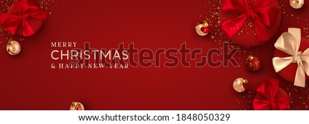 Christmas banner. Background Xmas design of realistic red gift box, 3d render bauble ball and glitter gold confetti. Horizontal christmas poster, greeting card, headers for website. Happy New Year.