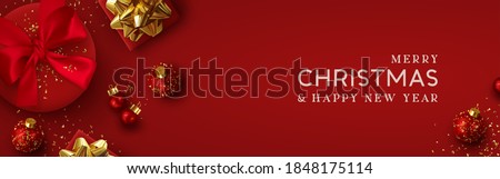 Christmas banner. Background Xmas design of realistic red gift box, 3d render bauble ball and glitter gold confetti. Horizontal christmas poster, greeting card, headers for website. Happy New Year.