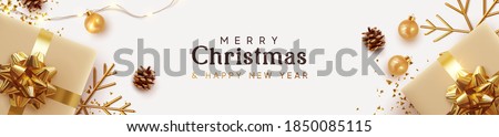 Christmas banner. Background Xmas design of sparkling lights garland, with realistic gifts box, golden snowflake and glitter gold confetti. Horizontal christmas poster, greeting cards, headers website