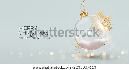 Christmas ornaments glass ball with snow inside. Christmas decorations transparent ball empty, hanging on golden ribbon, gold glitter confetti, bokeh lights. Realistic 3d design. Vector illustration