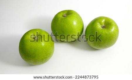 Similar – Image, Stock Photo Apples lie in a bowl on a scale and are weighed