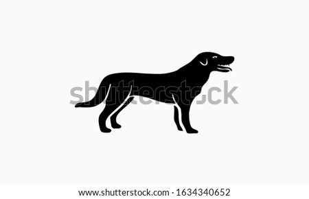 Vector silhouette of a dog on a white background.