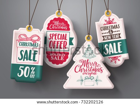 Christmas hanging sale tags vector set in white color with different shapes and greetings and discount text for christmas holiday marketing promotions. Vector illustration.
