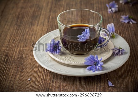 Chicory flowers and tea from chicory. Selective focus