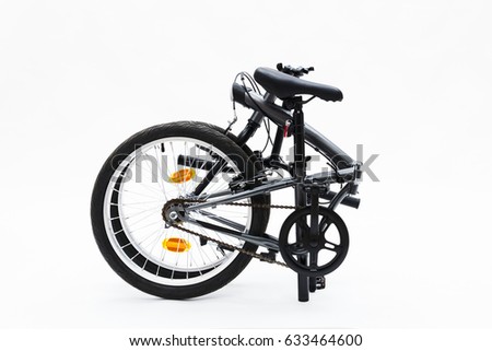 Similar – Image, Stock Photo Foldable bike by the ocean at sunset