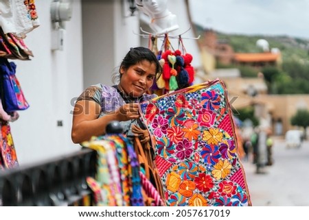 Image, Stock Photo Artisan woman working with torch on jewels