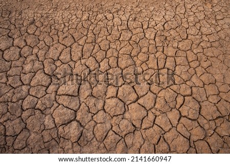 dry land in the dry season Drought, ground cracks, no hot water. Lack of humidity effect from global cracked soil in drought abstract nature background with cracked soil
 Сток-фото © 