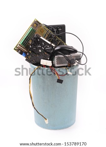 different computer parts in trash can