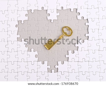 golden Key with heart shape puzzle