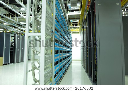 shot of network cables and servers in a technology data center(See more network cables and servers  backgrounds in my portfolio).
