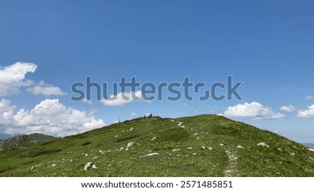 Similar – Image, Stock Photo Mountain ridge under blue cloudy sky