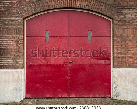 Industrial door in facade