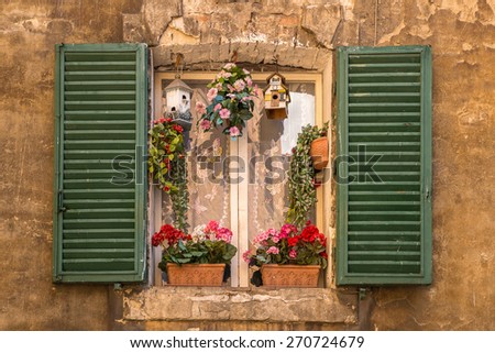 Louvre shutters at a home in Siena, Tuscany, Italy