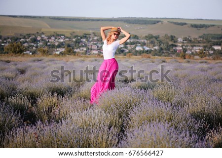 https://image.shutterstock.com/display_pic_with_logo/2554348/676566427/stock-photo-beautiful-blonde-girl-walk-on-the-lavender-field-in-golden-sunset-light-romantic-woman-wearing-676566427.jpg