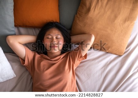 Similar – Image, Stock Photo Teenage girl lying in a blue armchair