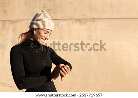 Similar – Image, Stock Photo young fit woman running away doing sport on a path in park