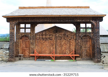 A traditional wooden gate from Rozavlea (Maramures, Romania). It is the acces gate in the churchyard.