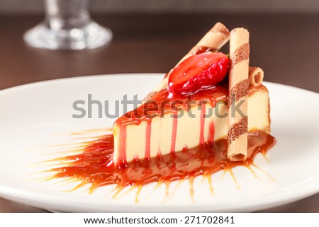 Caramel  cheesecake:Caramel cheesecake with strawberry and caramel sauce Location:at Rawan Cake in Amman Jordan