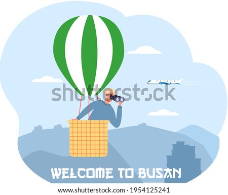 Welcome to Busan travel poster with man in hot air balloon looks through binocular in South Korea