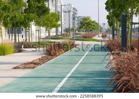 Similar – Image, Stock Photo empty cycling track on the street